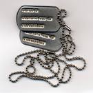 draft card dog tags social security numbers